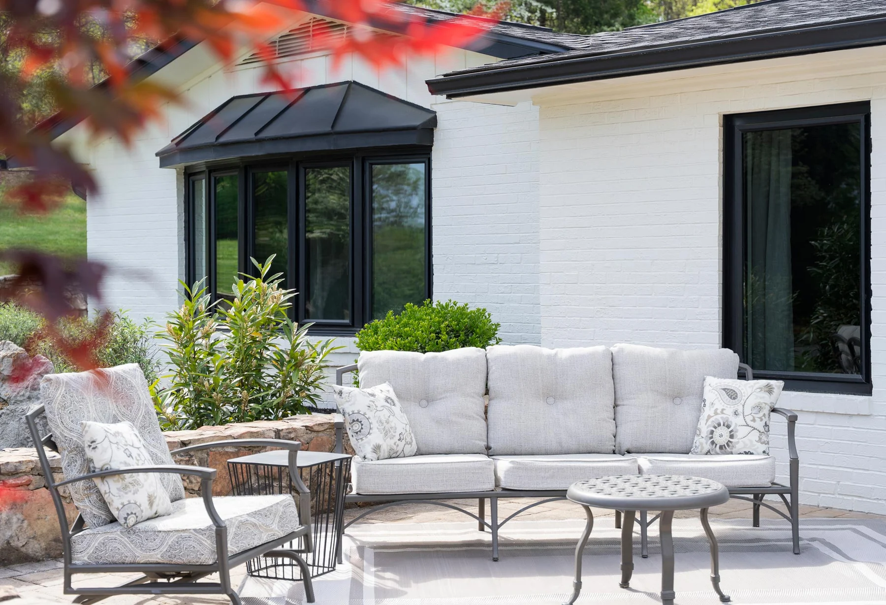 ProVia Endure black bow and casement windows on a home exterior