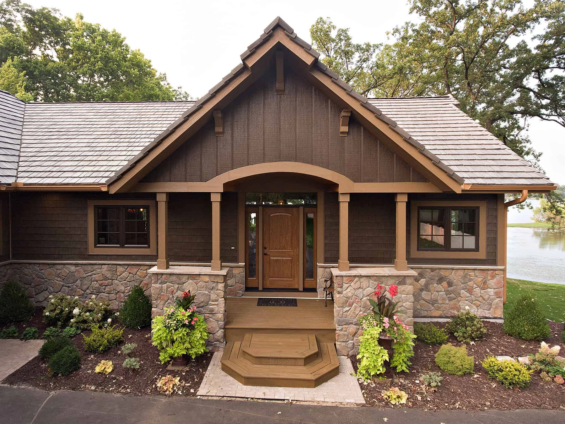 ProVia Aeris classic bronze casement windows on an exterior