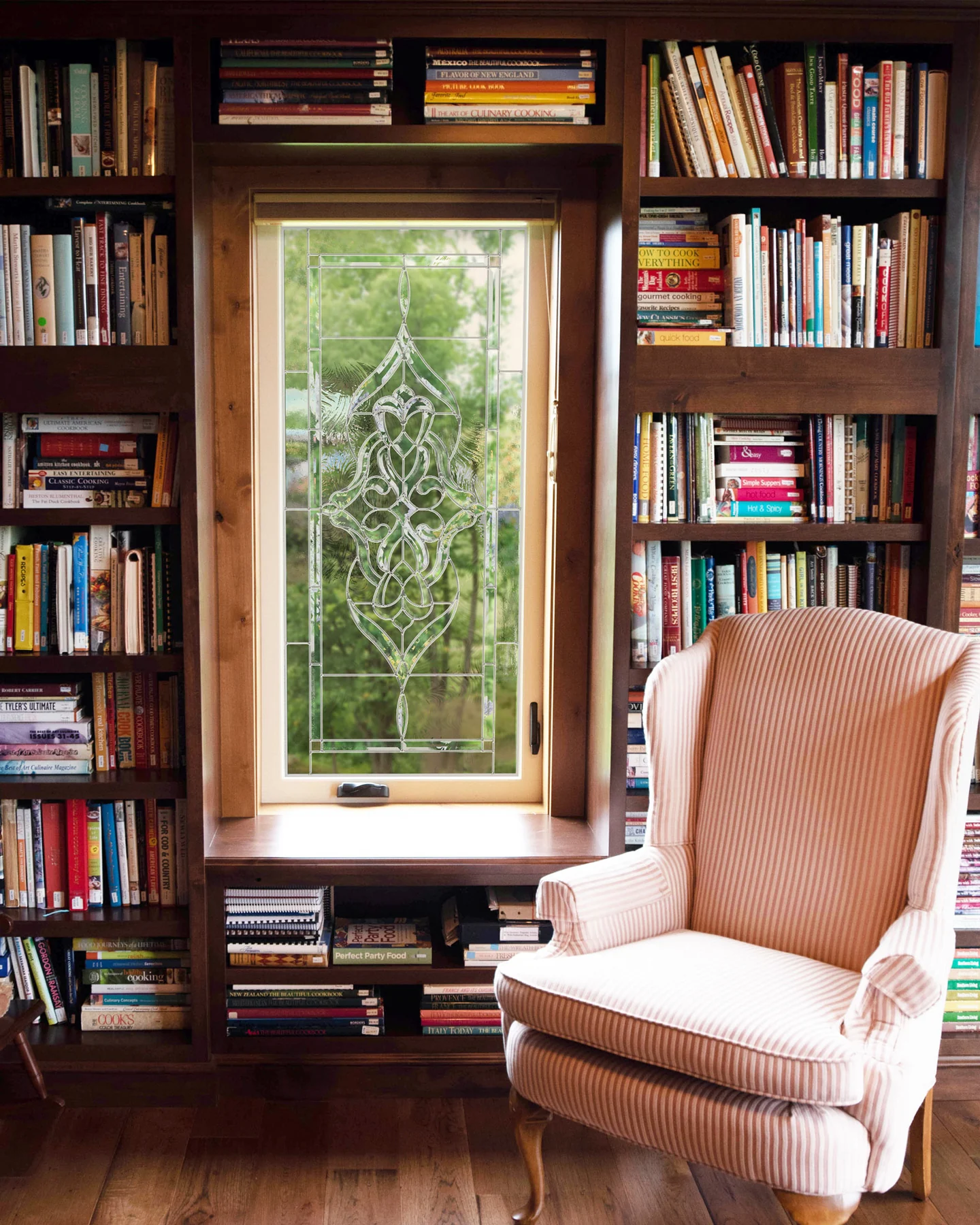 ProVia Aeris casement window with decorative glass in an interior room