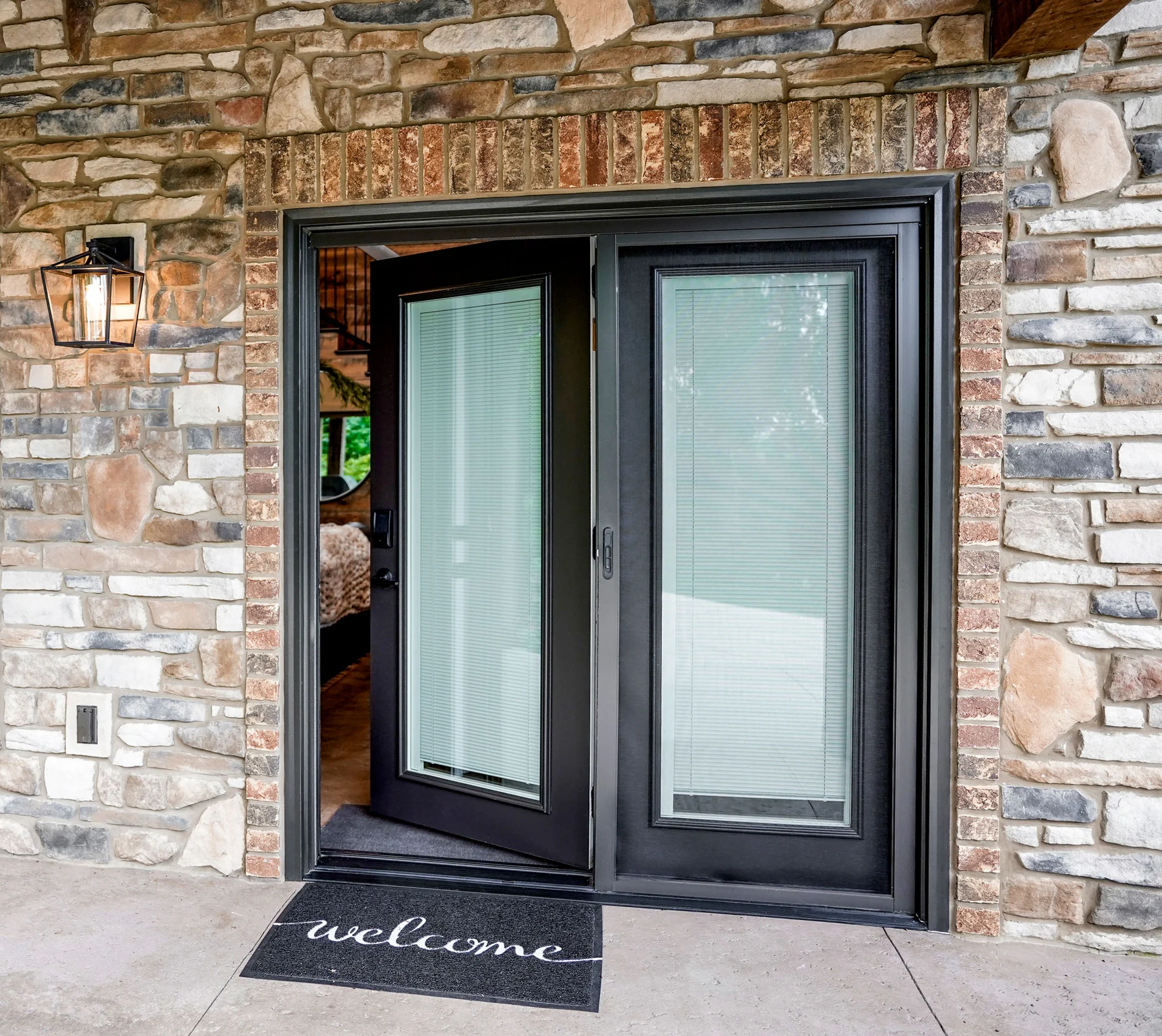 ProVia Legacy hinged patio door in rustic bronze