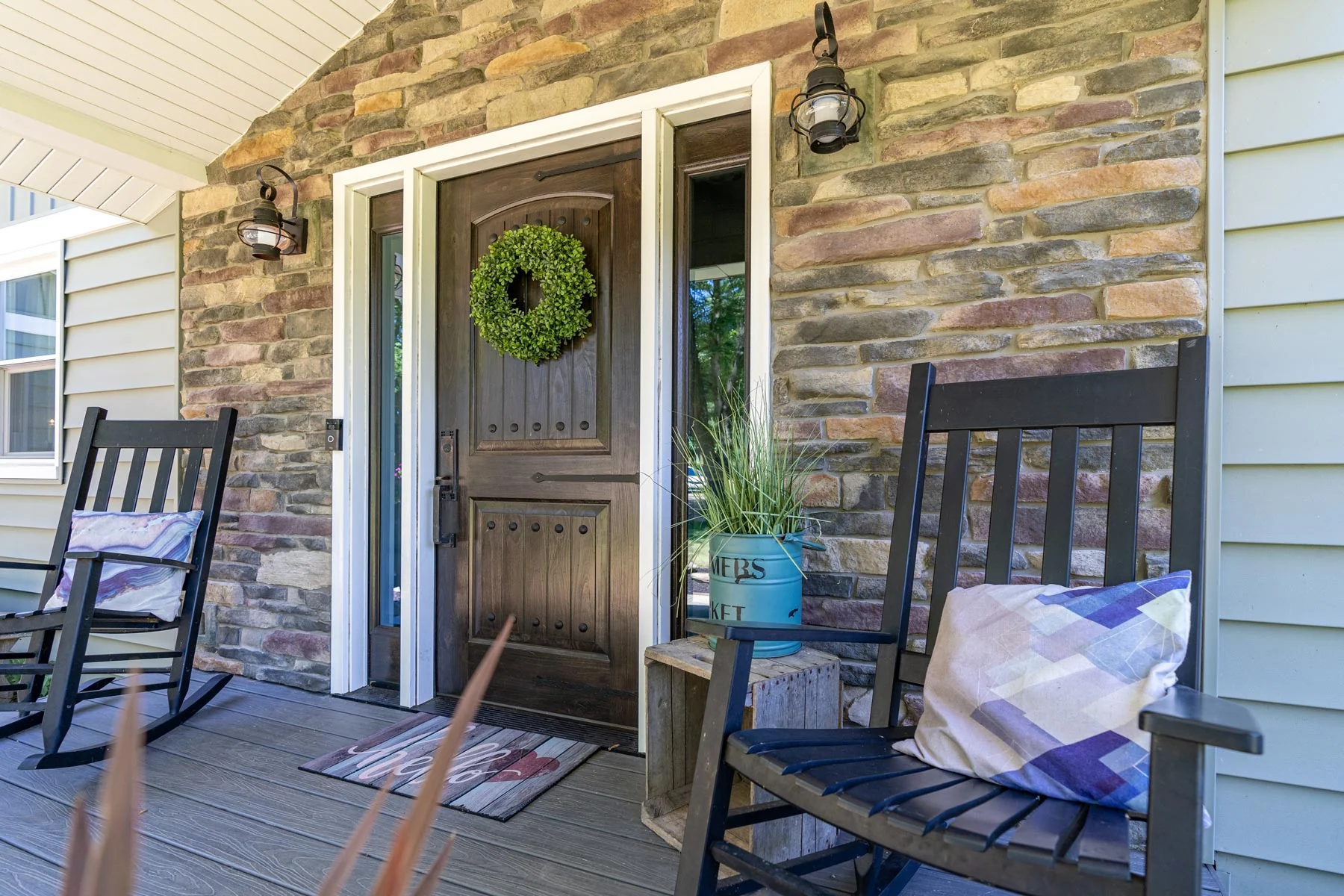 ProVia Signet entry door with sidelites on a covered porch